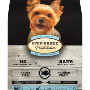 Bolsa con imagen de perrito pequeño y tierno mirando a la camara con alimento Oven Baked Tradition Adult Small Breed Fish - Adulto pequeño