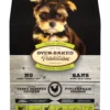 Bolsa con imagen de cachorrito tierno mirando la camara que contiene alimento Oven-Baked Tradition Puppy Small Breed - Chicken